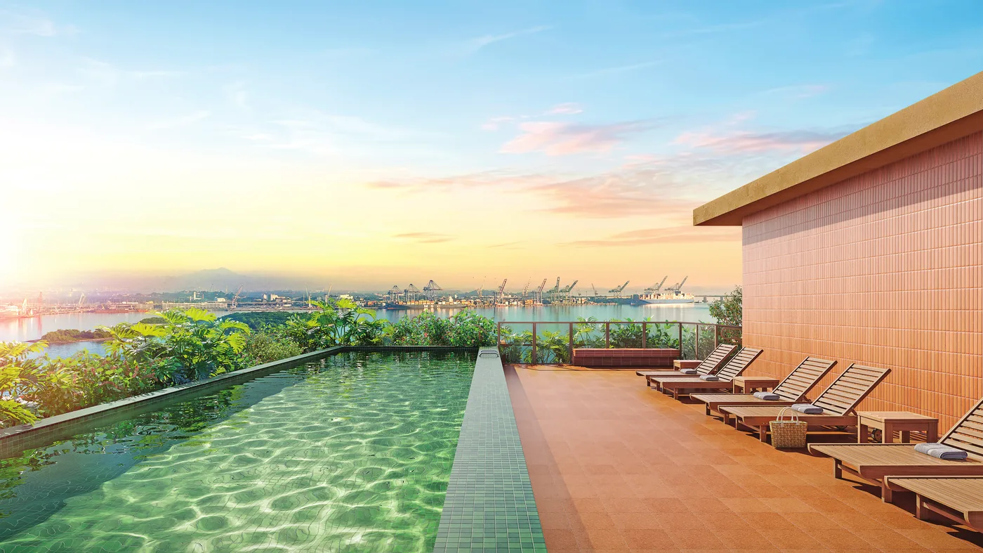 Piscina do rooftop do Residencial Erê da Cury, com solário e vista da Região Portuária do Rio de Janeiro